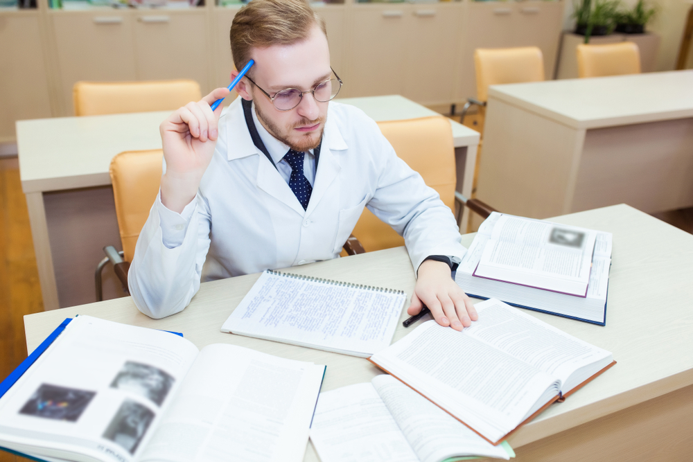 PhD in Psychology student conducting research for dissertation. Doctorate degrees in psychology can lead to rewarding careers for psych majors.