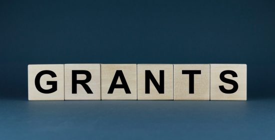 Grants - word spelled out with wooden subes